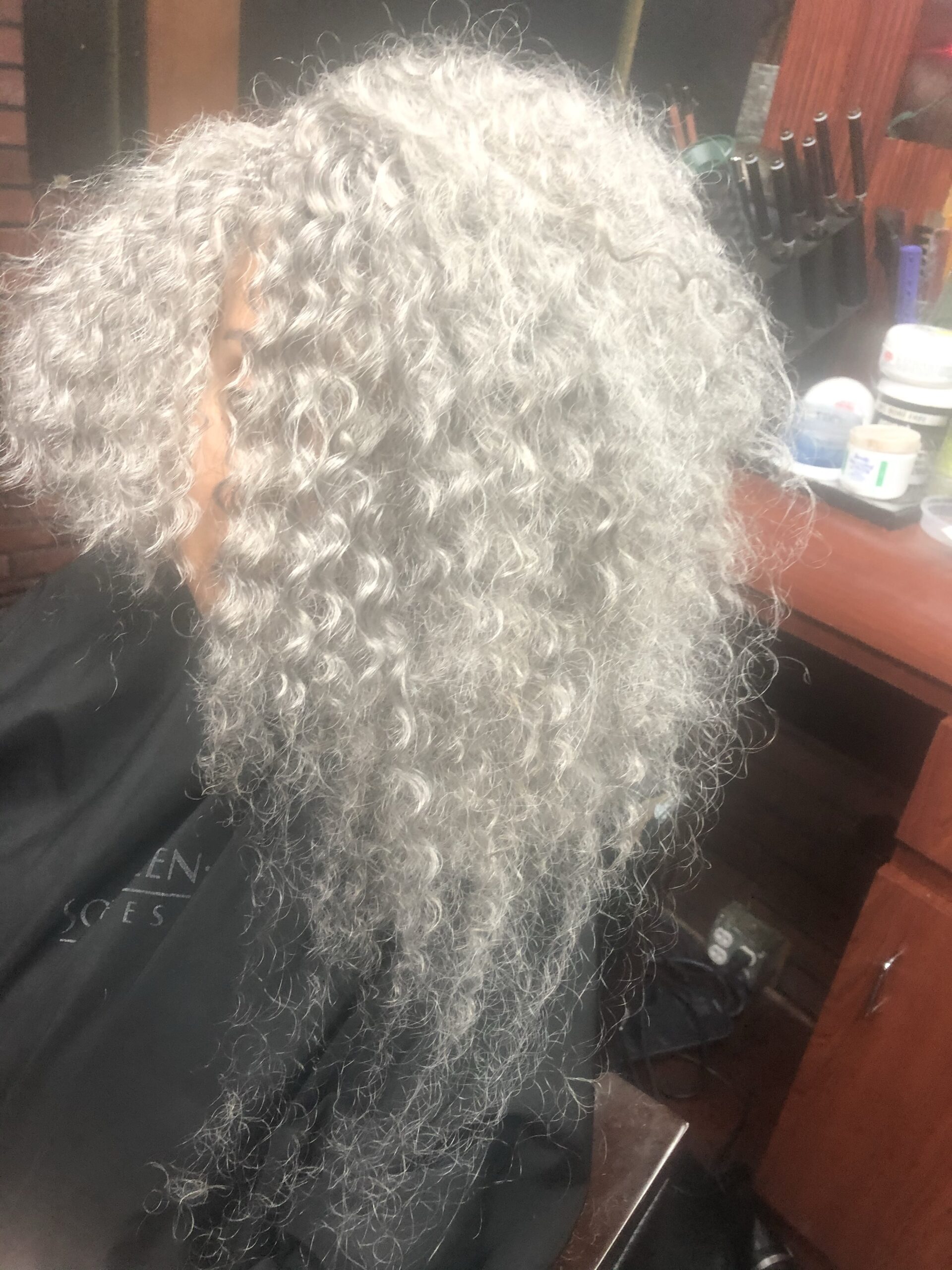 A gray curly hair